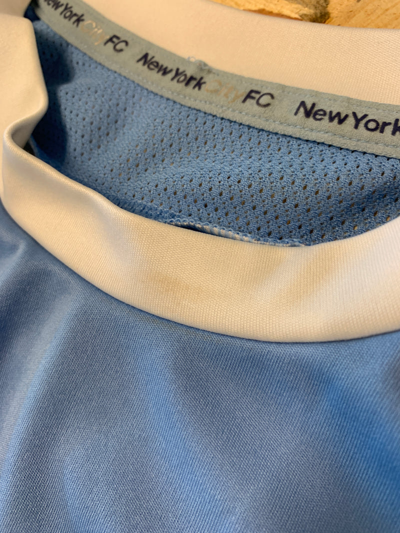 Maillot New York City FC 2015/16. Créez avec votre nom et numéro Maillot New York City FC 2015/16. Créez avec votre nom et numéro